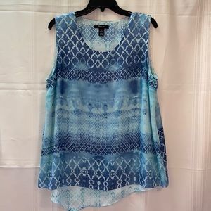Sleeveless sheer flowing blouse